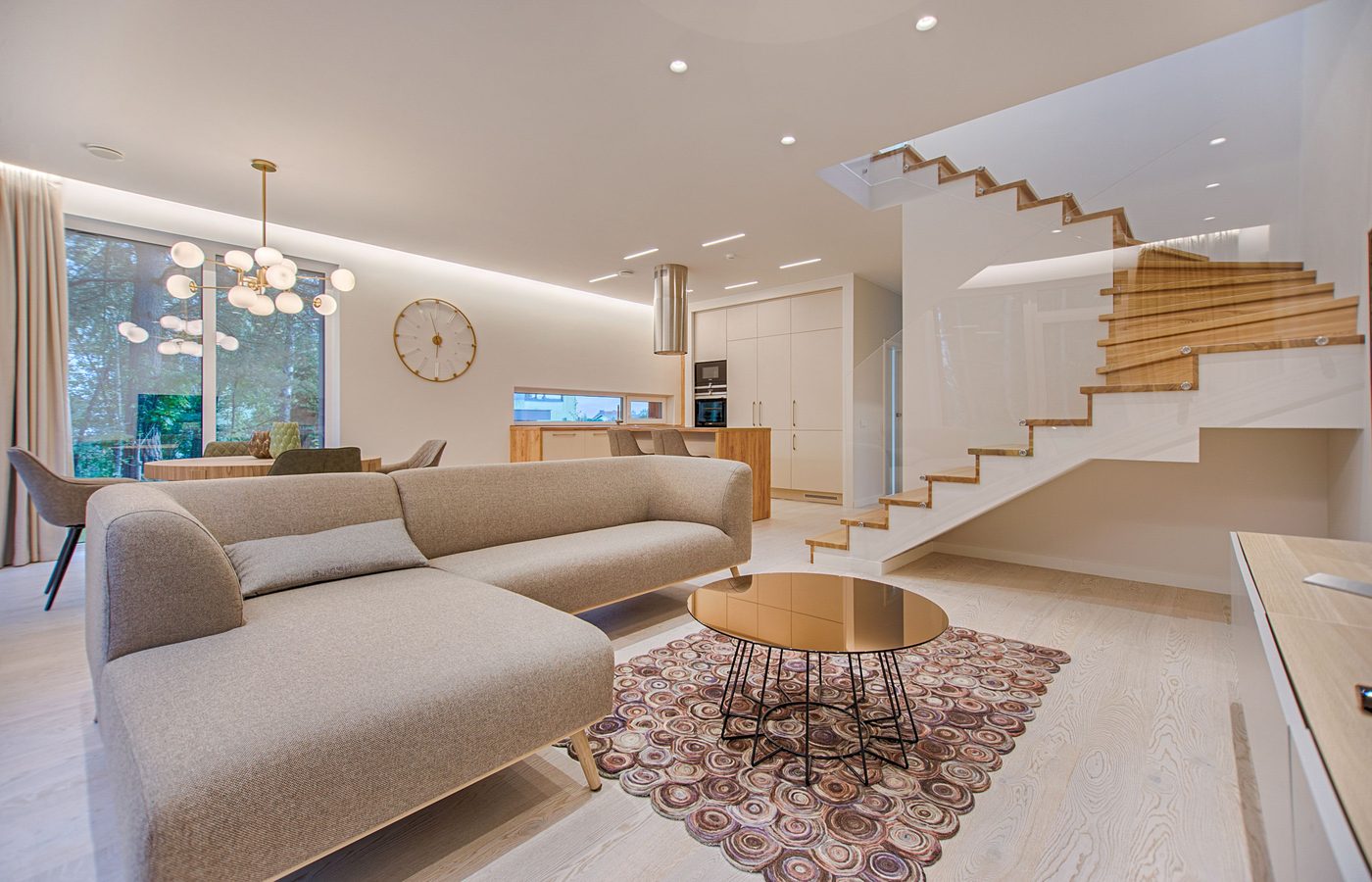 Light oak flooring in a modern open-concept living room